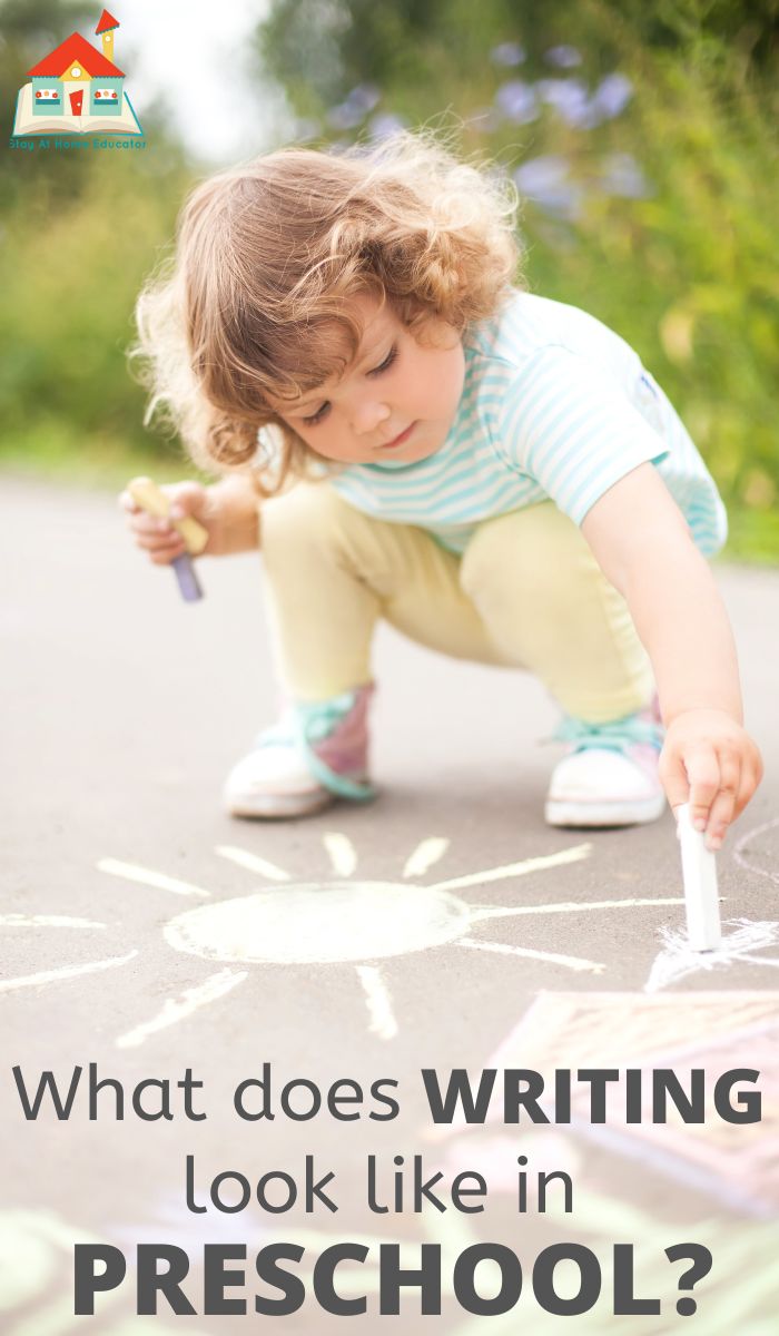 a preschooler engaging in preschool writing activities such as writing on the sidewalk with chalk 