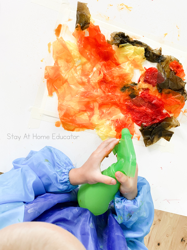 toddler process art ideas, tissue painted fall art for toddlers and preschoolers, fall process art ideas for toddlers and preschoolers