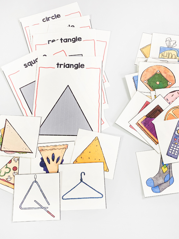 This shape center invites children to sort everyday, real-life shape examples by shape category. This center is included in the shapes daily lessons in preschool mathematics curriculum.
