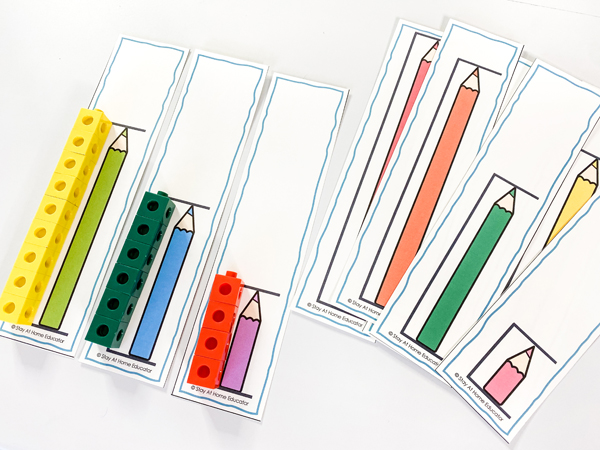 This measurement math center invites children to measure the length of the pencils to determine how many cubes were needed to identify length. This math center is included in our preschool measurement lesson plans.