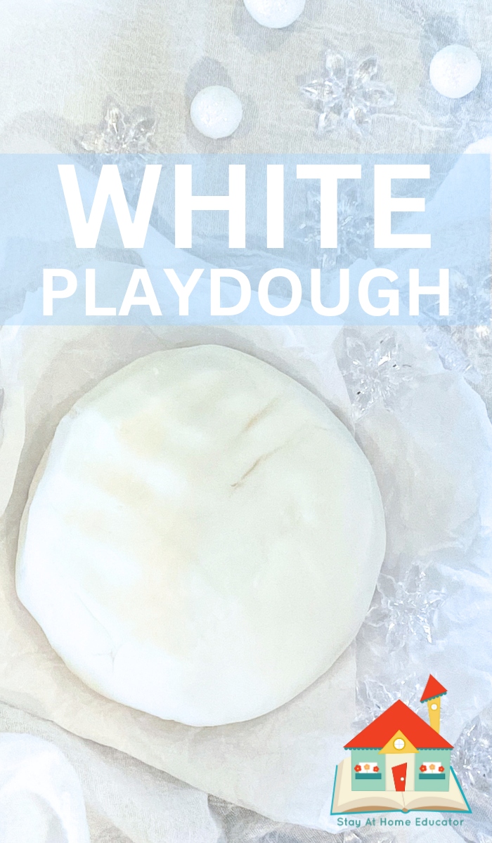 how to make white playdough | white playdough recipe without cream of tartar | ball of white playdough on parchment paper | winter playdough recipe