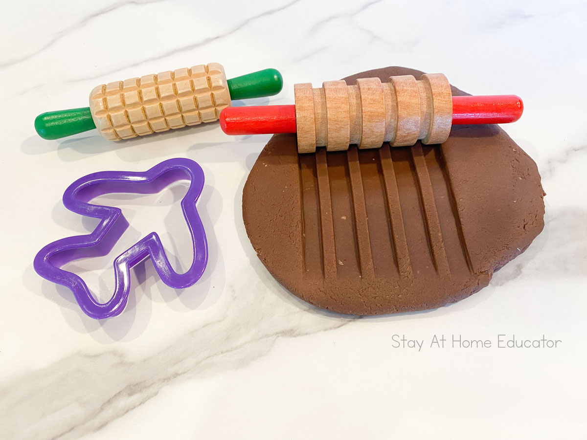 how to make brown playdough | brown playdough recipe | pancake of brown playdough with playdough rolling pin and cookie cutters